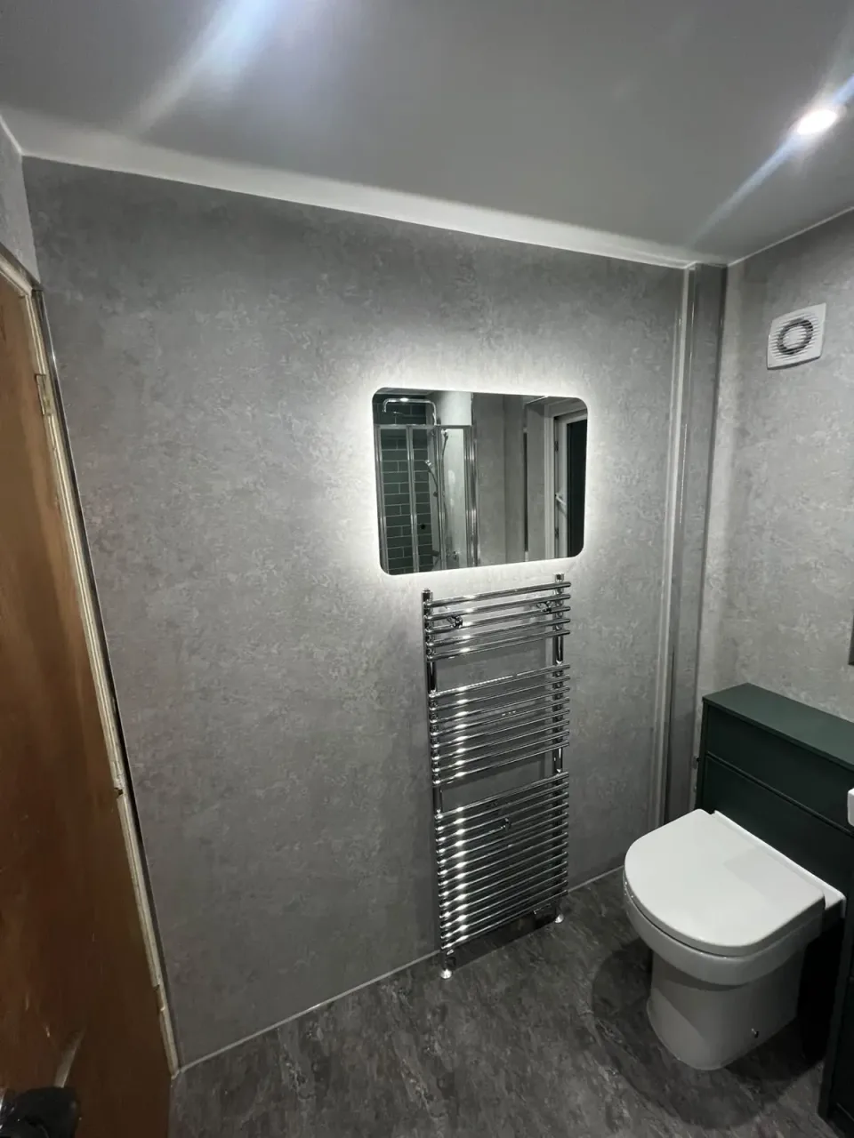 Mirror and towel storage details